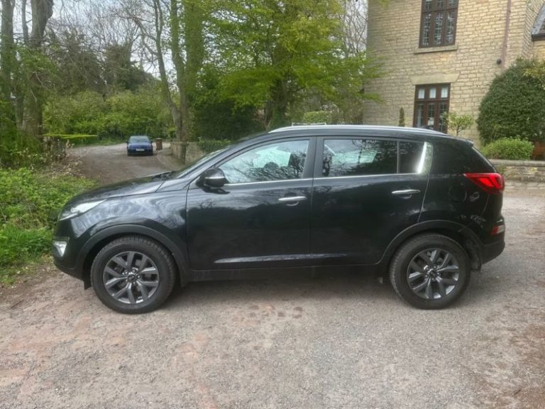 Black Kia Sportage SUV for sale at Carr Mill Motors in Billinge